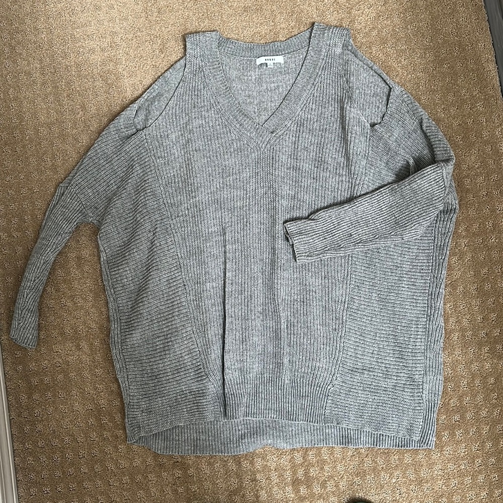 Oversized sweater with shoulder cut outs
